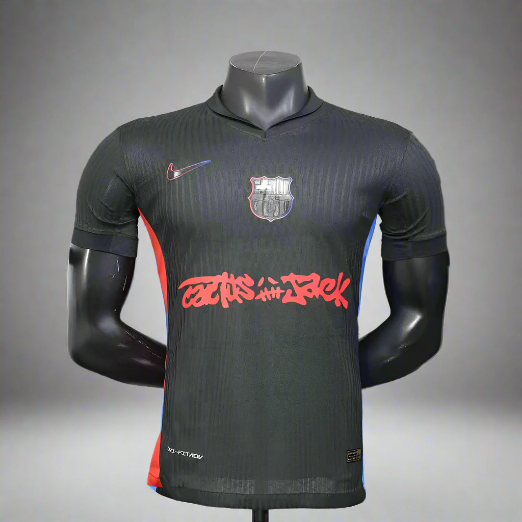 Black sports jersey with red text on a mannequin against a background